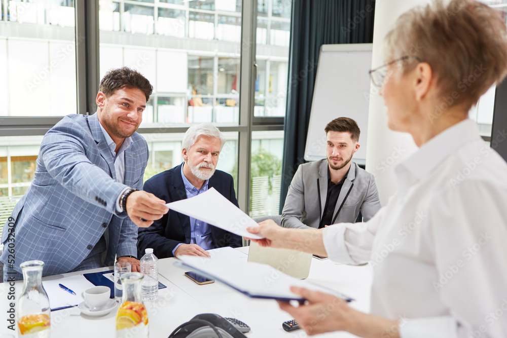 Business man as an applicant receives employment contract Business man as an applicant receives employment contract