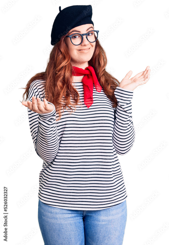 Young beautiful woman wearing french look with beret clueless and confused expression with arms and hands raised. doubt concept. Young beautiful woman wearing french look with beret clueless and confused expression with arms and hands raised. doubt concept.