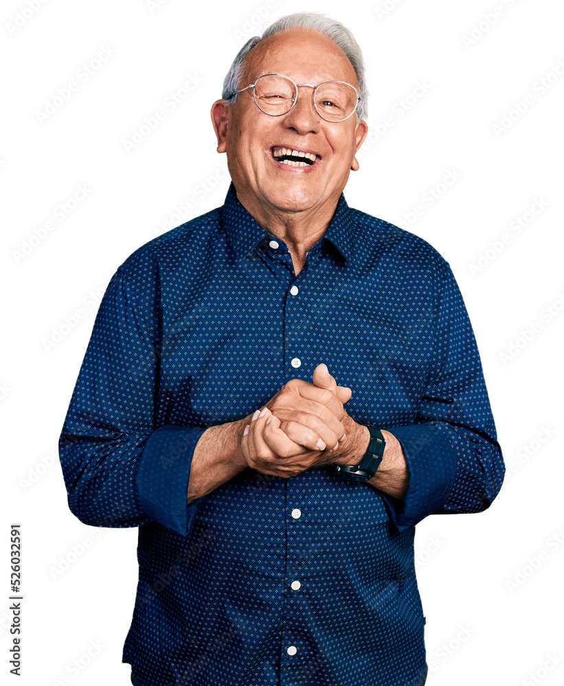 Senior man with grey hair holding hands together smiling and laughing hard out loud because funny crazy joke. Senior man with grey hair holding hands together smiling and laughing hard out loud because funny crazy joke.