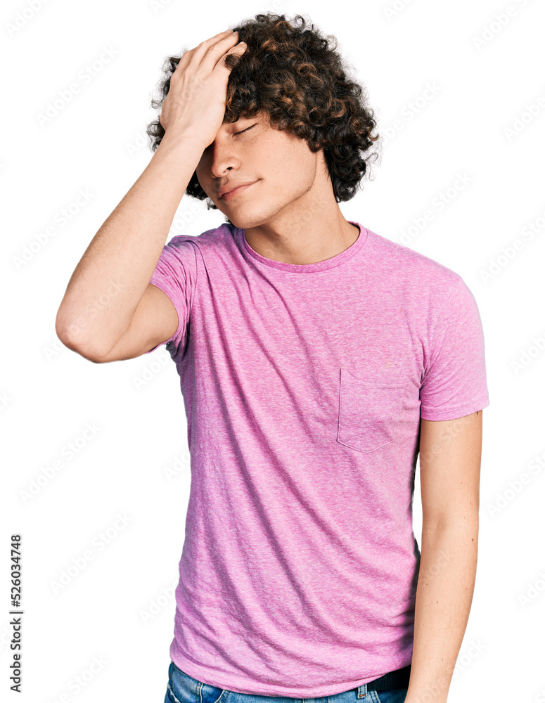 Caucasian teenager wearing casual clothes surprised with hand on head for mistake, remember error. forgot, bad memory concept. Caucasian teenager wearing casual clothes surprised with hand on head for mistake, remember error. forgot, bad memory concept.