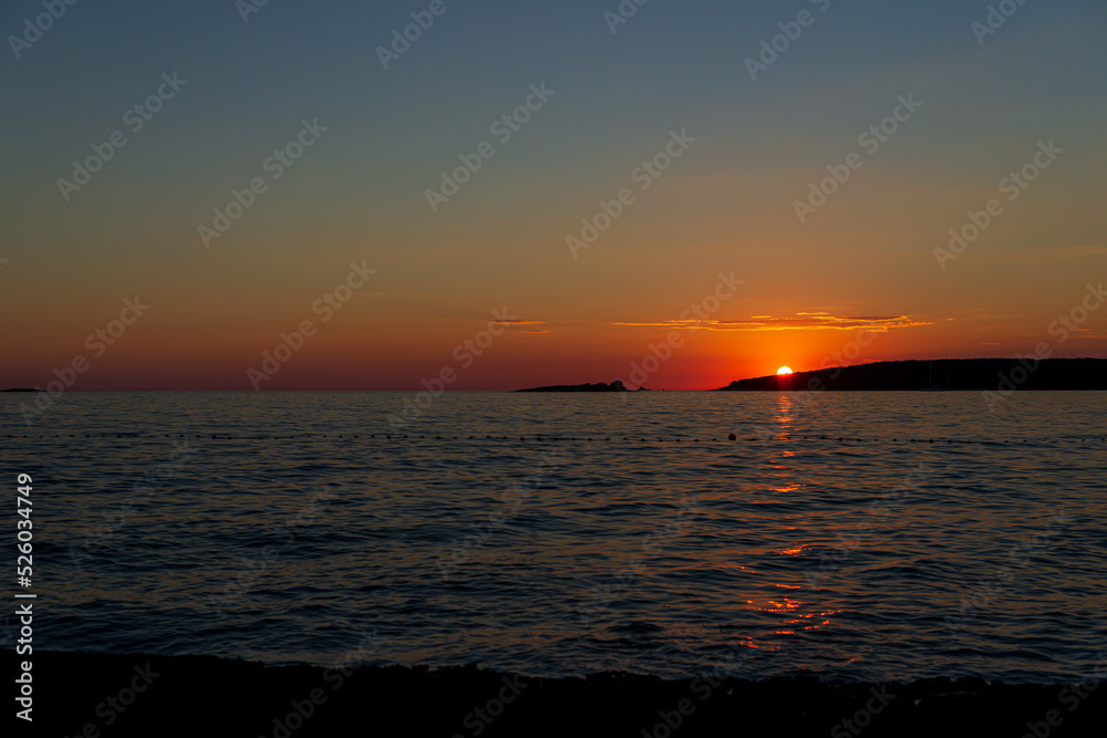 Obraz premium A beauty sunset with a boot 