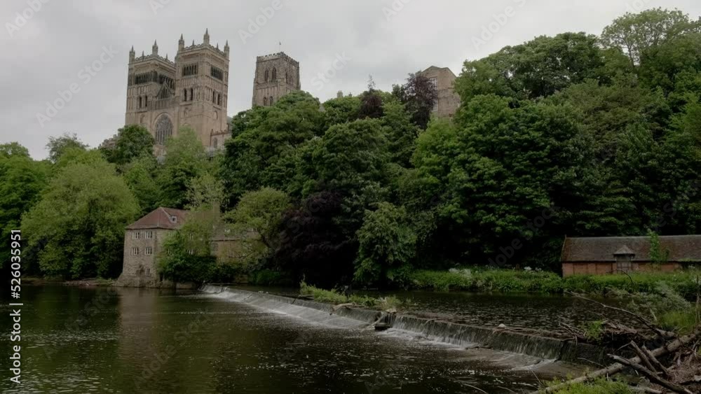Wide low angle shot of weir and Durham Cathedral Wide low angle shot of weir and Durham Cathedral