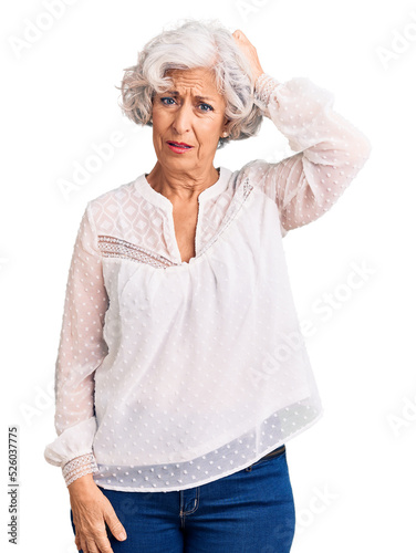 Senior grey-haired woman wearing casual clothes confuse and wonder about question. uncertain with doubt, thinking with hand on head. pensive concept.