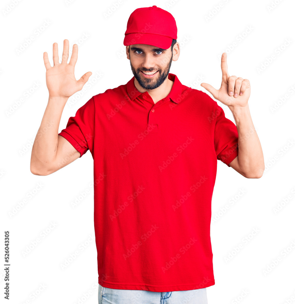 Young handsome man with beard wearing delivery uniform showing and pointing up with fingers number seven while smiling confident and happy. Young handsome man with beard wearing delivery uniform showing and pointing up with fingers number seven while smiling confident and happy.