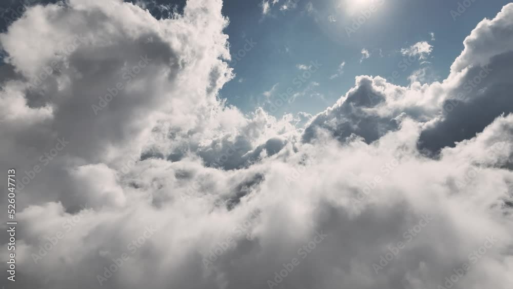 Real Flight through an amazingly beautiful cloudy landscape. Picturesque timelapse of white fluffy clouds moving gently across a clear blue sky. High above the ground where the clouds form