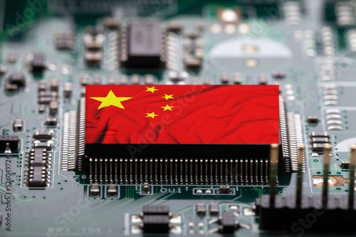 Flag of China on a processor, CPU Central processing Unit or GPU microchip on a motherboard. manufacturer, demonstrating the country's superiority in global supply chain. photo