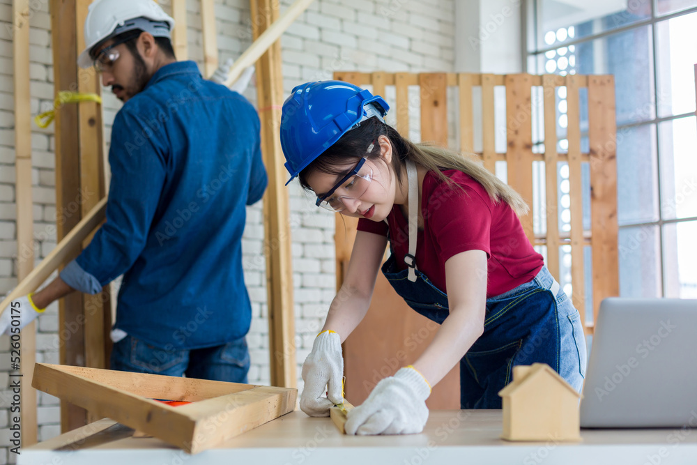 Carpenter working in carpentry shop. Carpenter working to making wood furniture in wood workshop Carpenter working in carpentry shop. Carpenter working to making wood furniture in wood workshop