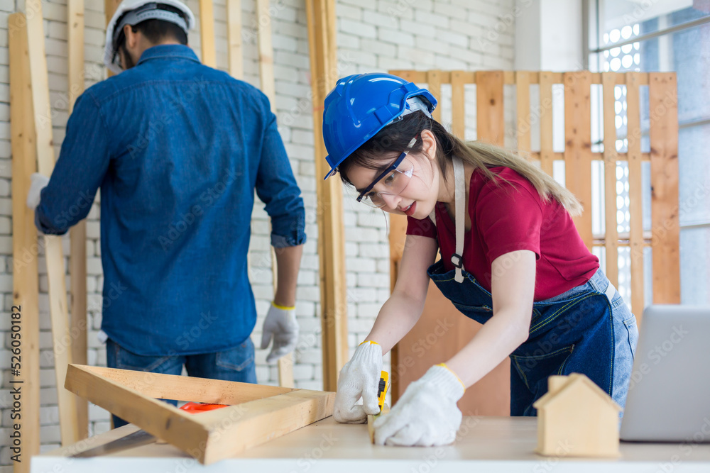 Carpenter working in carpentry shop. Carpenter working to making wood furniture in wood workshop Carpenter working in carpentry shop. Carpenter working to making wood furniture in wood workshop
