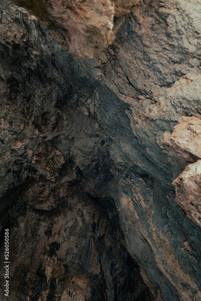 details of a rock wall inside a mountain cave