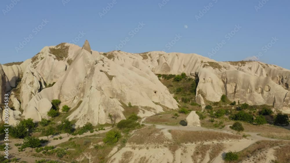 Drone flying over green farmland valley fields between rock formations Cappadocia turkey Drone flying over green farmland valley fields between rock formations Cappadocia turkey