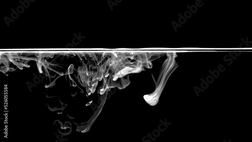 White color or ink is smoke on black background,Abstract smoke pattern,Colored liquid dye,Splash paint 