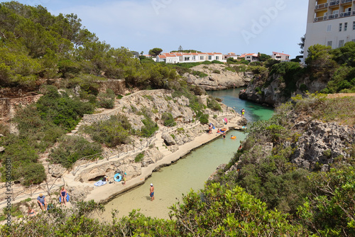 Cala en Forcat, Menorca (Minorca), Spain. Cala en Forcat - unique place surrounded by rocky cliffs and pines with shallow waters and two small beaches. The best snorkeling place photo