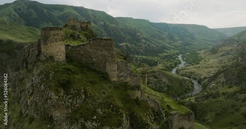 Sideway Aerial Of Tmogvi Fortress Atop The Rocky Mountains In Samtske-Javakhet, Georgia. photo