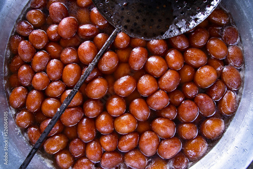 Red Sweet Rosogolla Bangladeshi Traditional Food background textured photo