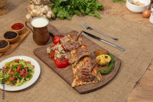 Lamb chop and vegetables on wooden table stock photo
Adana, Barbecue - Meal, Beef, Belgium, Bread