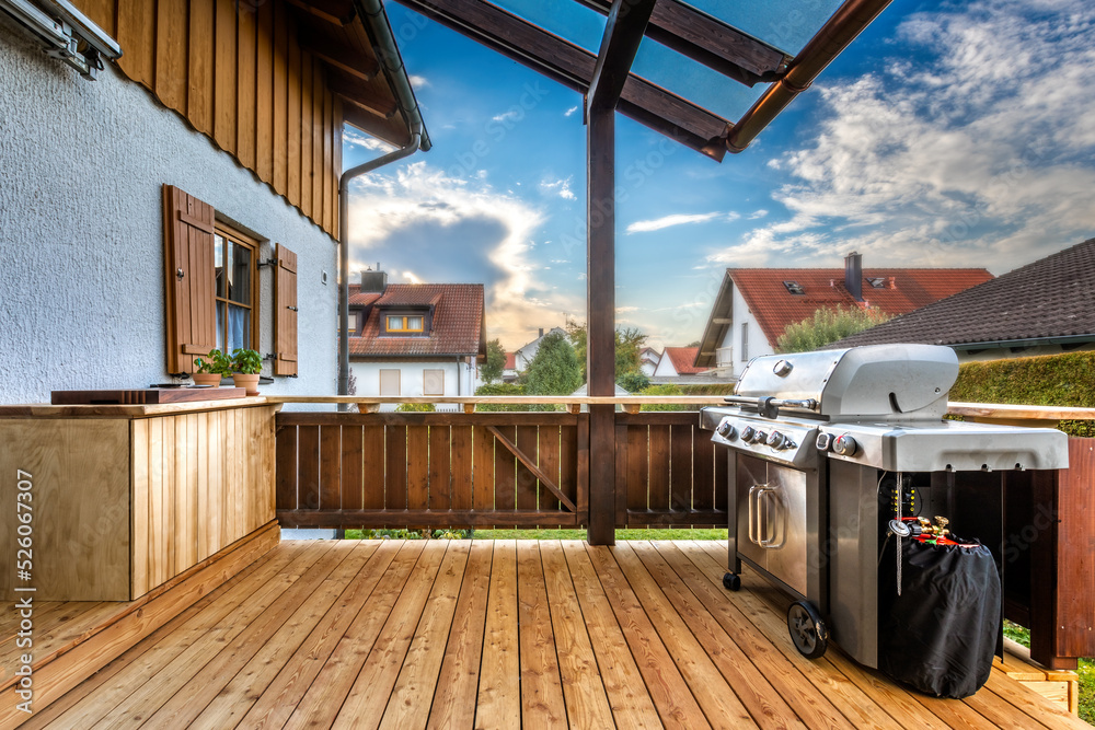 Covered deck with outdoor kitchen and bbq grill, Germany Bavaria Stock-Foto  | Adobe Stock