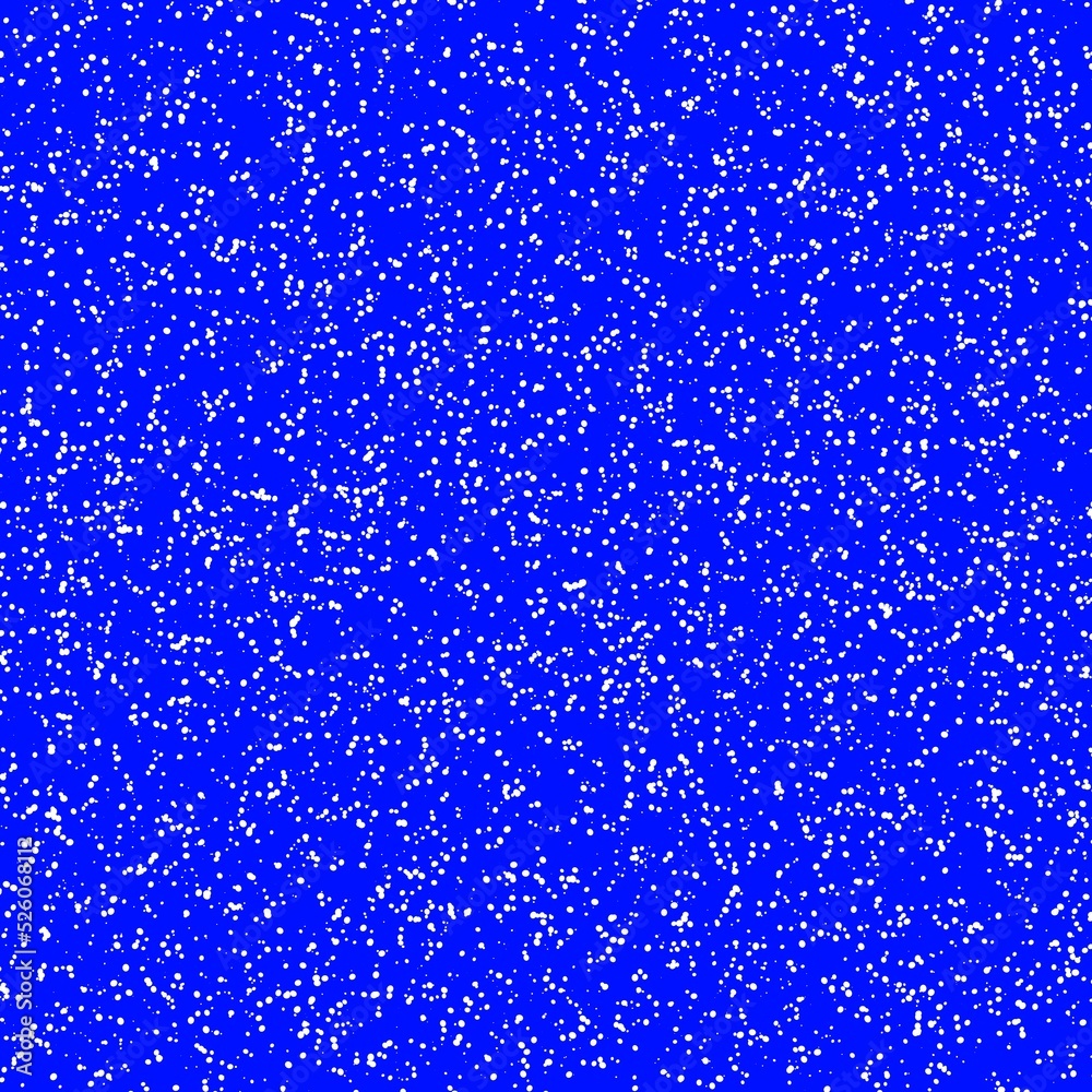 Obraz premium White speckled paper on a blue surface.