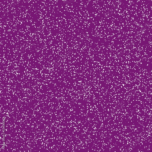 White speckled paper on a darg magenta surface.