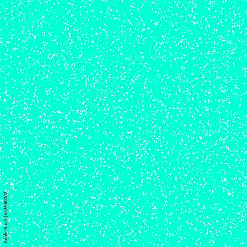 White speckled paper on a cyan surface