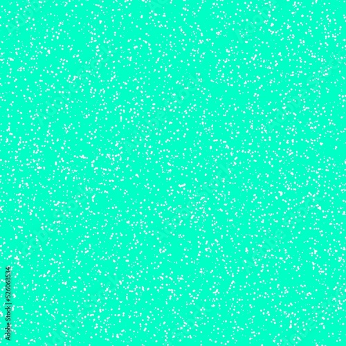 White speckled paper on a cyan surface