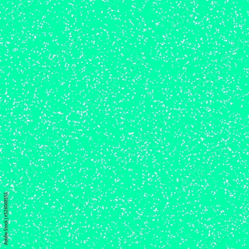 White speckled paper on a vivid cyan - lime green surface