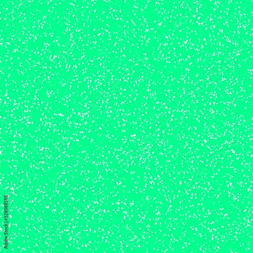 White speckled paper on a vivid cyan - lime green surface