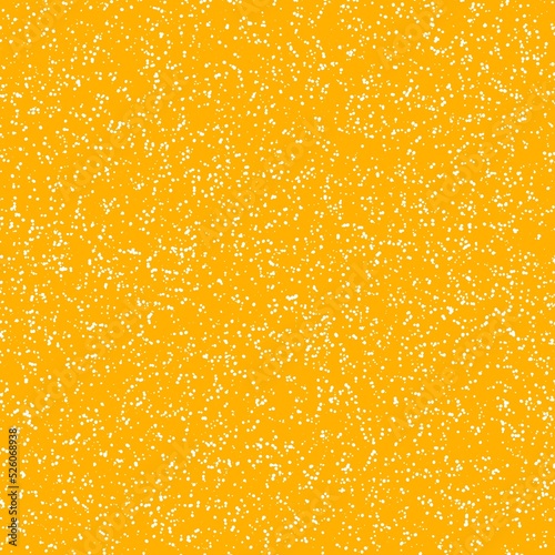 White speckled paper on yellow surface