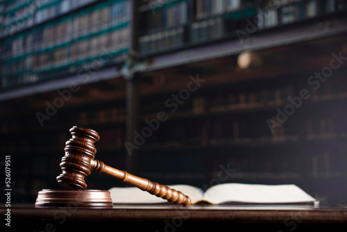 Gavel. Auction sale and business concept.  Gavel and commercial code on the dark gray  background.