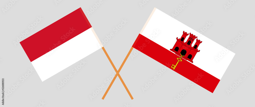 Crossed flags of Indonesia and Gibraltar. Official colors. Correct proportion