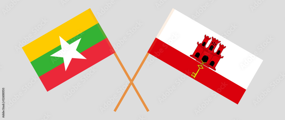 Crossed flags of Myanmar and Gibraltar. Official colors. Correct proportion