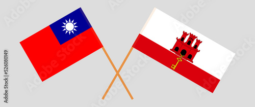 Crossed flags of Taiwan and Gibraltar. Official colors. Correct proportion