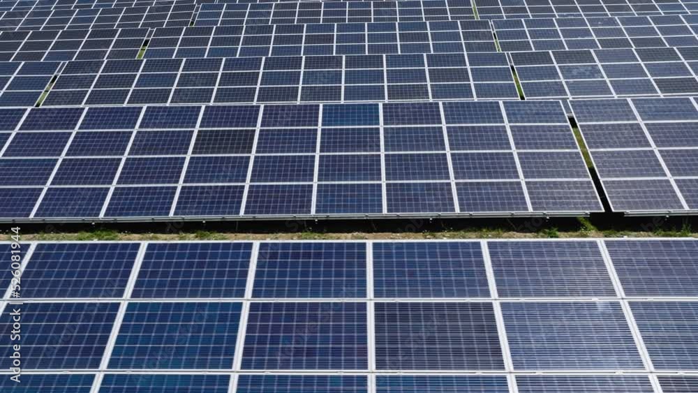 Photovoltaic panels reflecting light, close-up Photovoltaic panels reflecting light, close-up