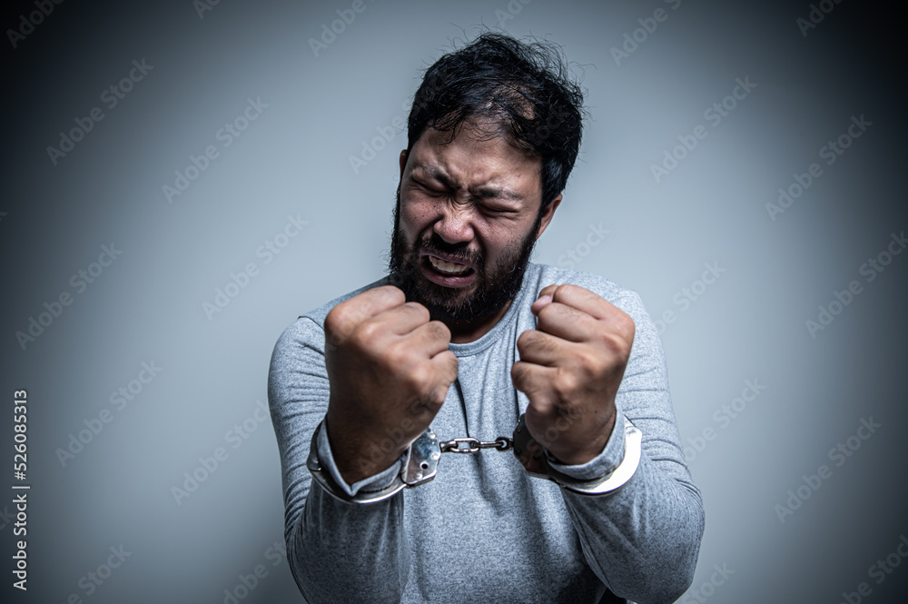 Asian handsome man angry on white background,Portrait of young Stress male concept,Bad mood after talking on the phone