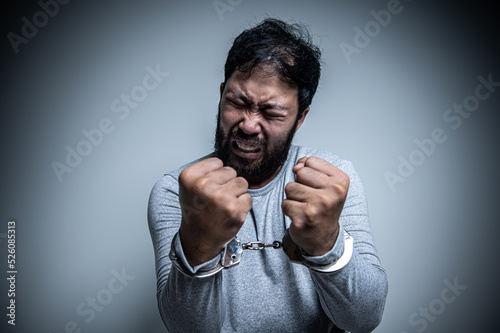 Asian handsome man angry on white background,Portrait of young Stress male concept,Bad mood after talking on the phone