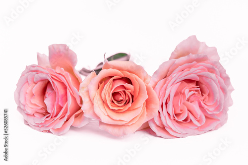 Fototapeta Naklejka Na Ścianę i Meble -  Composition of beautiful flowers on a white background. Roses, lilies, mint grass, Arrangement of flowers, arrangement of pink flowers on the table. Pastel colors. Valentine's Day. Mothers Day. Women'