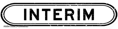 Grunge black interim word rubber seal stamp on white background