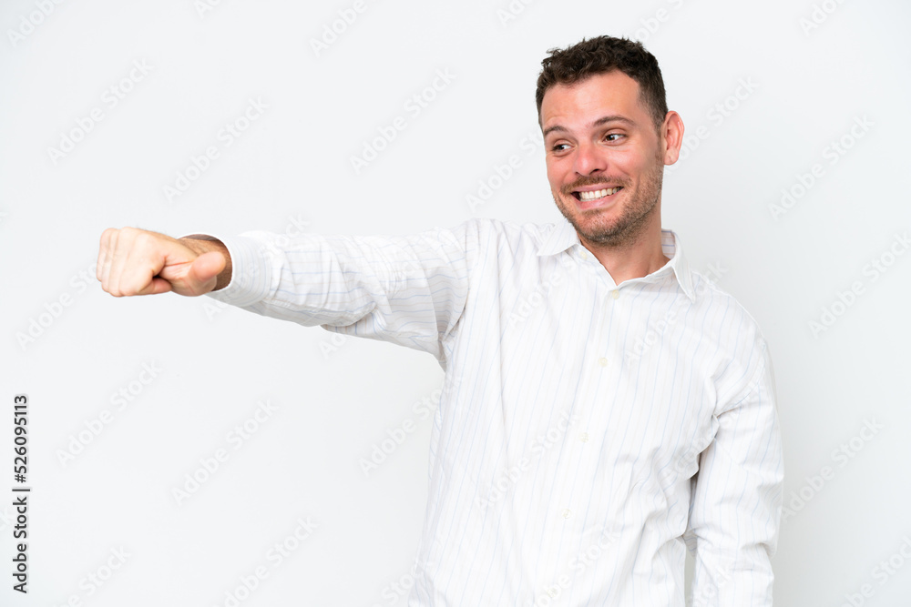 Young caucasian handsome man isolated on white background giving a thumbs up gesture