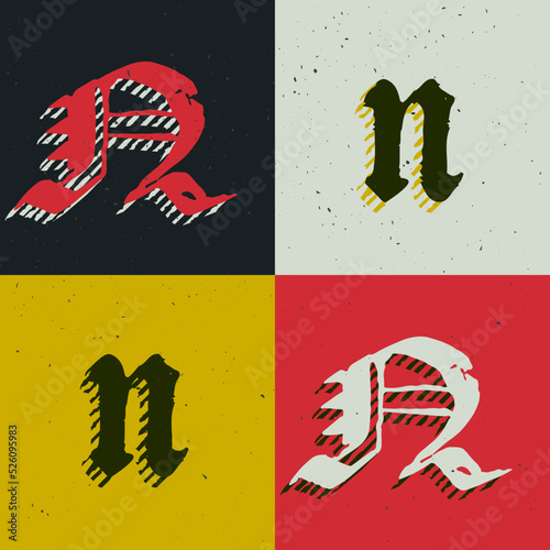 N letter blackletter style logo set with grunge texture. Stylish horror gothic font.