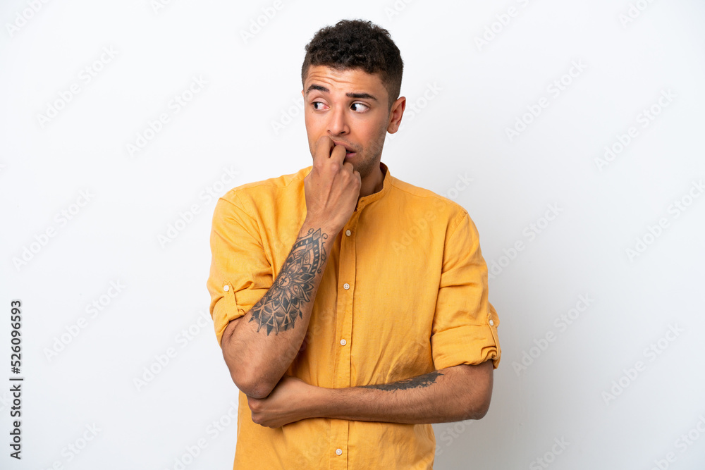 Young caucasian Brazilian man isolated on white background nervous and scared Young caucasian Brazilian man isolated on white background nervous and scared