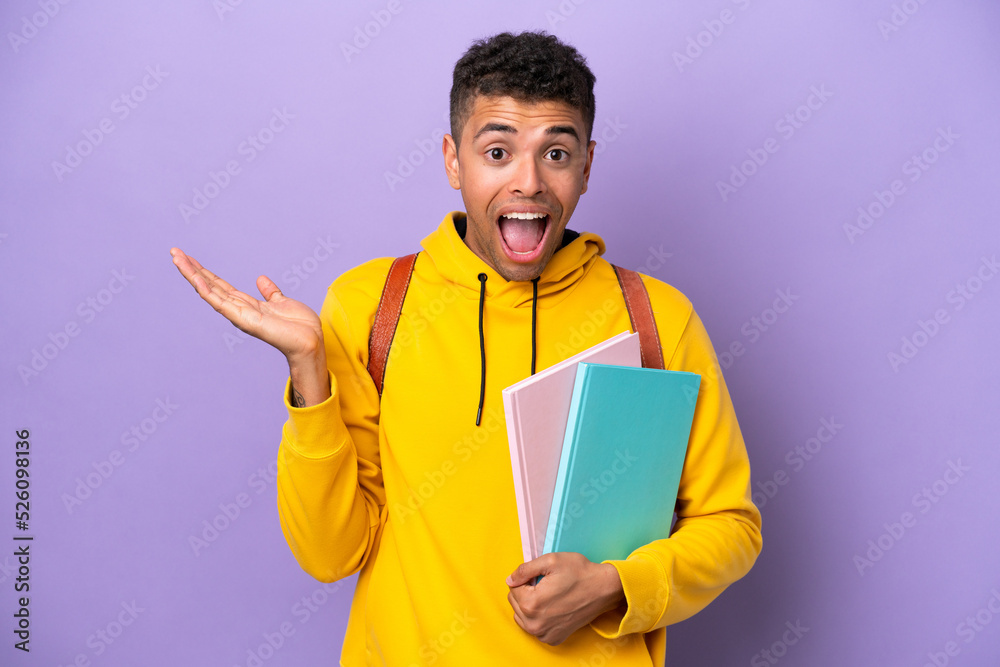 Young student Brazilian man isolated on purple background with shocked facial expression Young student Brazilian man isolated on purple background with shocked facial expression