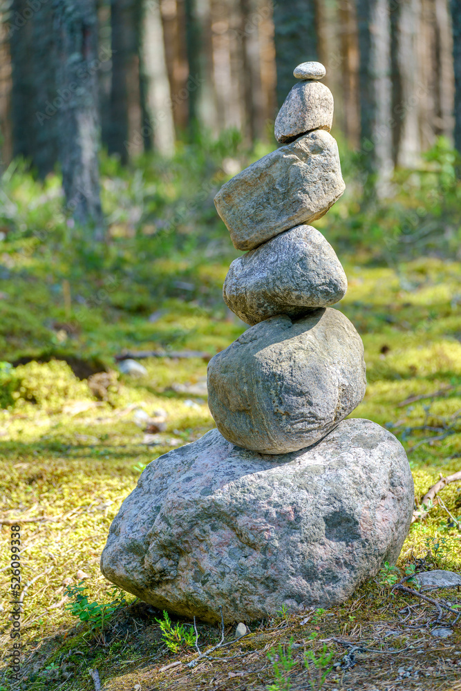 Pyramid of stones. Unstable balance of stone objects. Idyllic state of nature. Pyramid of stones. Unstable balance of stone objects. Idyllic state of nature.