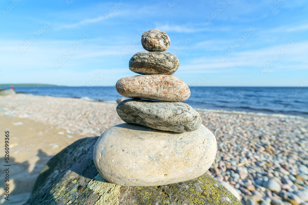 Pyramid of stones. Unstable balance of stone objects. Idyllic state of nature. Pyramid of stones. Unstable balance of stone objects. Idyllic state of nature.