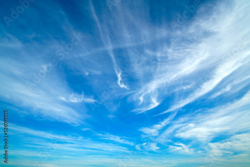 White clouds in the blue sky. Beautiful natural background.