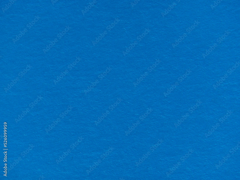 Textured background made of dark blue paper. The texture of blue paper. Blue textured background made of recycled cardboard Textured background made of dark blue paper. The texture of blue paper. Blue textured background made of recycled cardboard