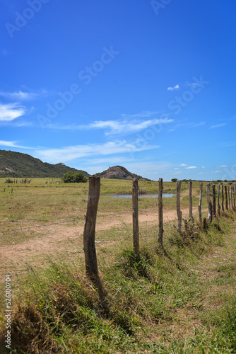 landscape with lake, fence and mountain, Araruna, Pb, Paraíba, Brazil, brazilian trails, travels in brazil, northeastern brazil