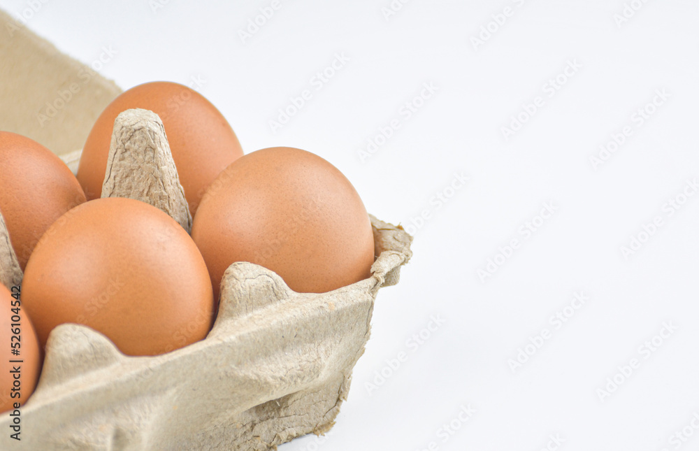 Fresh and appetizing eggs are packed in egg cartons. put on a white background Fresh and appetizing eggs are packed in egg cartons. put on a white background