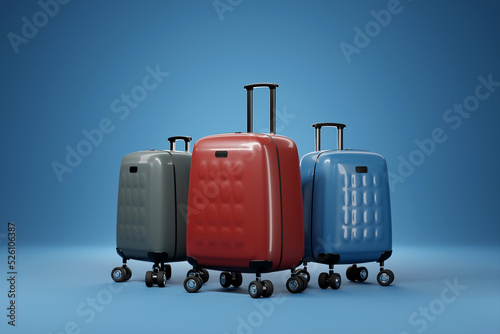 Close-up of luxurious and elegant blue, red and gray plastic suitcases on a  blue background. Travel vacation vacation concept. 3d illustration