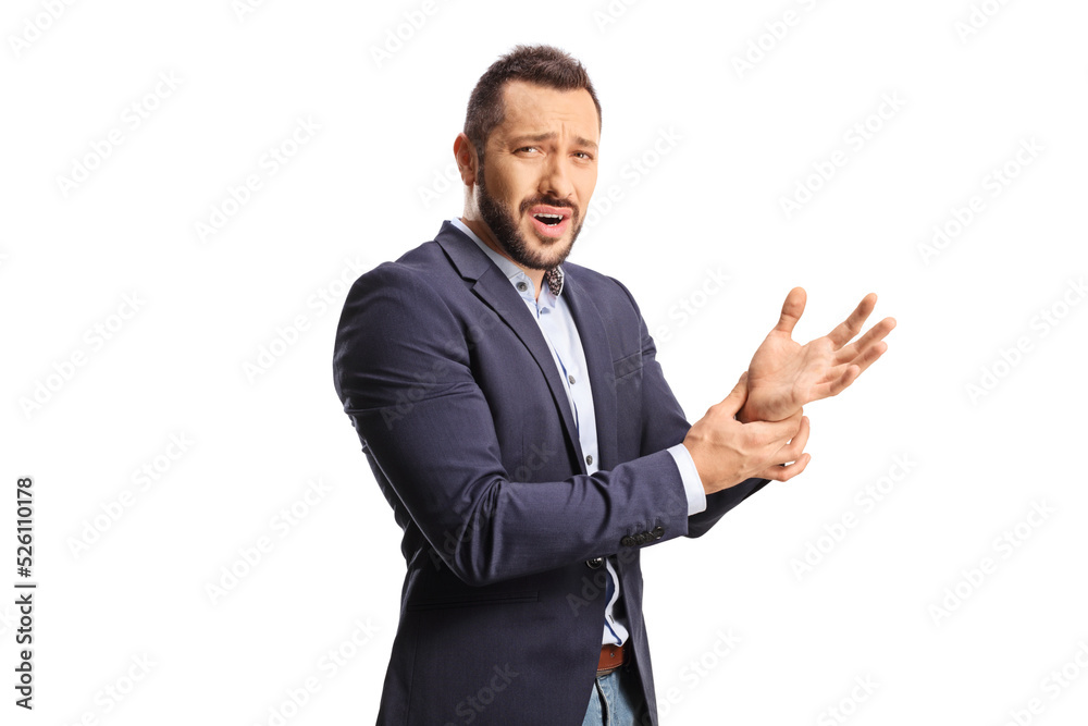 Professional man holding his painful wrist Professional man holding his painful wrist