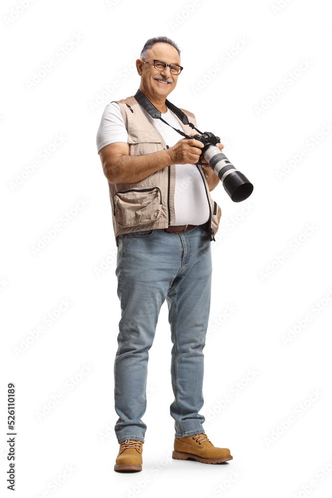 Full length shot of a mature male photographer smiling at camera Full length shot of a mature male photographer smiling at camera