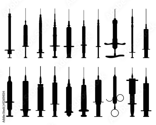 Black silhouettes of syringes on a white background	